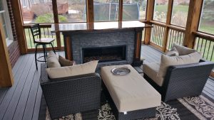 Gas powered fire place is the cherry on top of a great custom 3 seasons room 